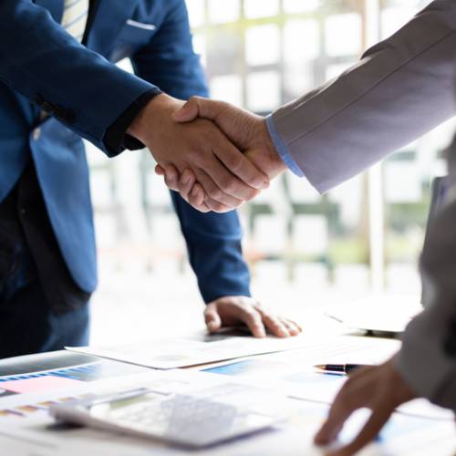 Company Incorporation Services Handshake between business partners symbolizing successful company incorporation in Singapore