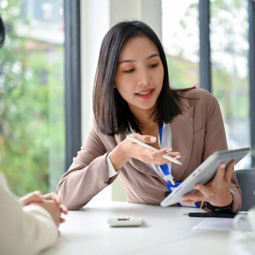 Corporate Secretarial Services Business professional reviewing corporate documents as part of corporate secretarial services in Singapore
